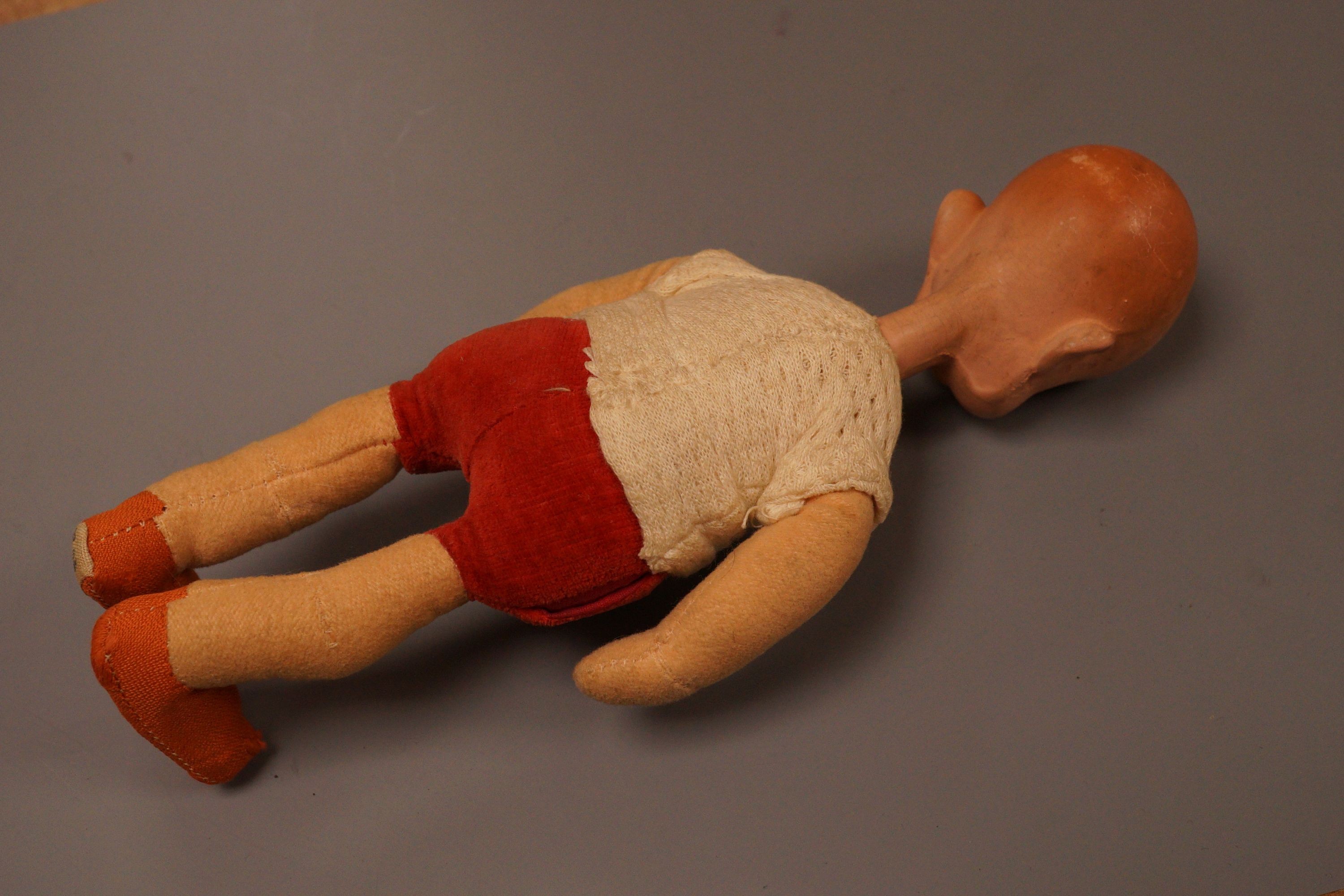 A rare Deans Rag book Henry doll, in original condition, c.1930, some slight staining to the face, 22cm